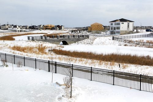 NEW HOMES - 112 Lake Bend Road in Bridgwater Lakes. Hearth Homes Liam Milne rep was there. BORIS MINKEVICH / WINNIPEG FREE PRESS December 8, 2014