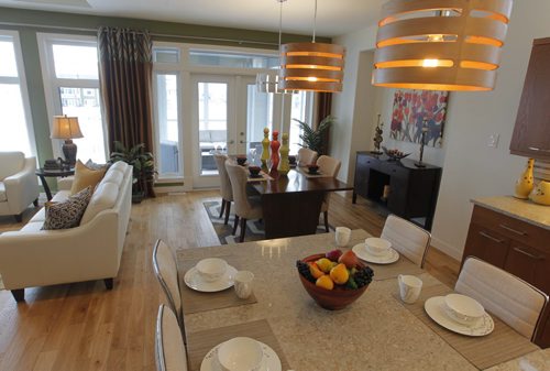 NEW HOMES - 112 Lake Bend Road in Bridgwater Lakes. Hearth Homes Liam Milne rep was there. BORIS MINKEVICH / WINNIPEG FREE PRESS December 8, 2014