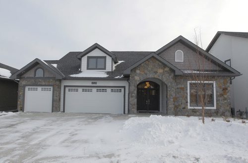 NEW HOMES - 112 Lake Bend Road in Bridgwater Lakes. Hearth Homes Liam Milne rep was there. BORIS MINKEVICH / WINNIPEG FREE PRESS December 8, 2014