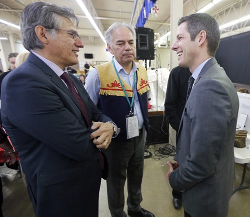 Stdup RtoL Wpg Mayor Brian Bowman meets with AMC Ghislain Picard AFN national candidate and Grand Chief Matthew Coon Come at the Indian Metis Friendship Centre morning breakfast fund raiser.Dec. 9 2014 / KEN GIGLIOTTI / WINNIPEG FREE PRESS