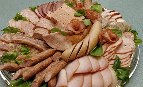 ENT - REST REVIEW Karpaty --Marion Warhaft review  of  Karpaty Meats and Deli , a take-aways food  story with meat platter containing . Kolbassa , old fashion ham,  jellied tongue .Staff LtoR is some photos  Natalia Adrianovych, Adam ,Mike and Bogdan Barczak Jola Kotula   Dec. 10 2014 / KEN GIGLIOTTI / WINNIPEG FREE PRESS