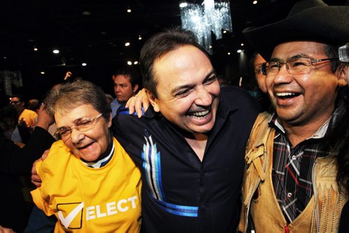 The newly elected Grand Chief Perry Bellegarde (centre) with his seconders, Chief Roger William (right) and Chief Marianna Couchie (third from left) after the Assembly of First Nations election Wednesday afternoon at the Winnipeg Convention Centre.  141210 December 10, 2014 Mike Deal / Winnipeg Free Press
