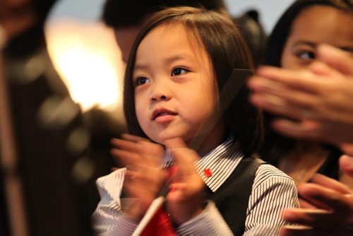 Four-year-old Ethan Dulman claps with family after they received their Canadian Citizneship Wednesday afternoon during a special ceremony at the CMHR.   This was the first of many citizenship ceremonies to be held at the museum.    Dec 10,  2014 Ruth Bonneville / Winnipeg Free Press
