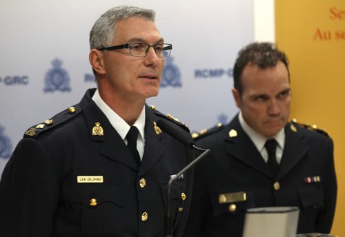 Superintendent Len Del Pino, Officer in Charge of Federal Policing, RCMP D division, left, and Superintendent Danny Smyth, Officer in Charge of Investigative Operations, Winnipeg Police Servicenews conference Thursday afternoon displaying items seized from Project Distress  The 15 month investigation has 14 people charged with seizures of over six kilos of cocaine, eight kilos of methamphetamine, other drugs, cash and numerous weapons See Kevin Rollason story  Dec 11, 2014   (JOE BRYKSA / WINNIPEG FREE PRESS)