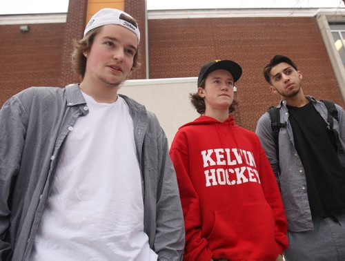 Kelvin High students L to R- Alex Nanton, Gr 12, Cole Ferguson, Gr 11, Maged Hesso, Gr 12 comment on technology teacher Brad Badiuk who was put on paid leave by the Winnipeg School Division while investigating comments he made on Facebook about aboriginal people- See Alexander Paul story  Dec 11, 2014   (JOE BRYKSA / WINNIPEG FREE PRESS)