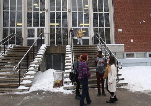 Kids outside Kelvin High School- teacher Brad Badiuk who was put on paid leave by the Winnipeg School Division while investigating comments he made on Facebook about aboriginal people- See Alexander Paul story  Dec 11, 2014   (JOE BRYKSA / WINNIPEG FREE PRESS)