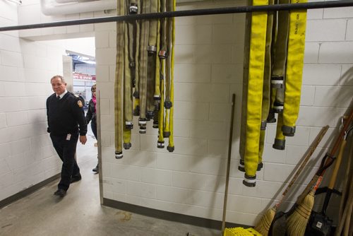 Deputy Chief Joe Seewald shows where the fire hoses are dried during a tour of the new Winnipeg Fire Paramedic Service Station 11 at Portage Avenue and Route 90. 141211 - Thursday, December 11, 2014 -  (MIKE DEAL / WINNIPEG FREE PRESS)