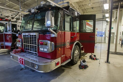 Gear at the read by the fire trucks during a tour of the new Winnipeg Fire Paramedic Service Station 11 at Portage Avenue and Route 90. 141211 - Thursday, December 11, 2014 -  (MIKE DEAL / WINNIPEG FREE PRESS)