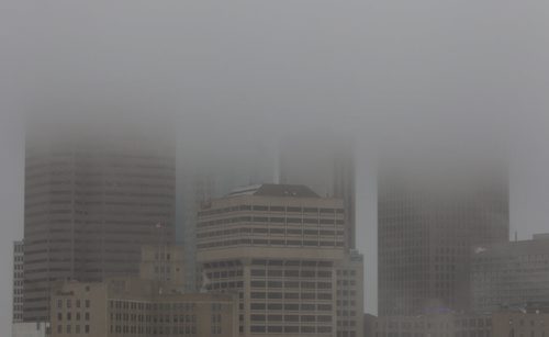 Winnipeg's downtown skyscrapers are covered in low hanging clouds Sunday morning. 141214 - Sunday, December 14, 2014 -  (MIKE DEAL / WINNIPEG FREE PRESS)
