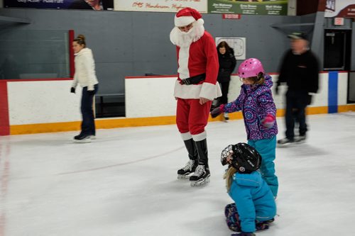 SKATE WITH SANTA - Kids and adults had the chance to strap on the blades and hit the ice with the Jolly Old Elf at Gateway Recreation CentreÄôs Skate with Santa on Sunday. 141214 - Sunday, December 14, 2014 -  (MIKE DEAL / WINNIPEG FREE PRESS)
