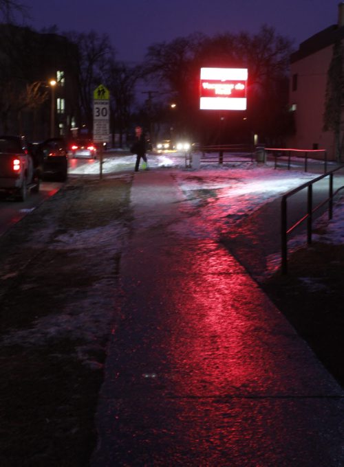 Icy sidewalk on Rue St. Jean Baptiste Monday morning as temperatures drop after the mild weekend weather. Wayne Glowacki / Winnipeg Free Press Dec.15 2014