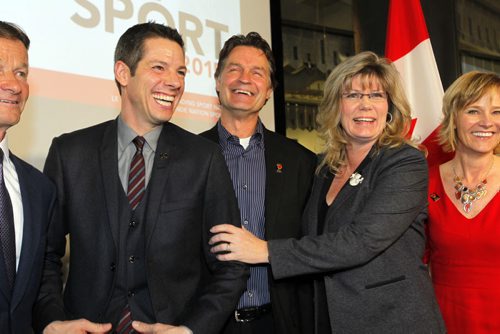 LOCAL - Press conference - Support for phase II of the Sport for Life Centre and update on Canada Games 2017. (face half cut off on left) Hubert Mesman, co-chair of the Winnipeg bid committee, City of Winnipeg Mayor Brian Bowman, Jeff Hnatiuk. President and Chief Executive Officer /Sport Manitoba, Canadian Heritage and Official Languages Minister Shelly Glover, and Co-Chair 2017 Host Society Mariette Mulaire (in red). BORIS MINKEVICH / WINNIPEG FREE PRESS December 15, 2014