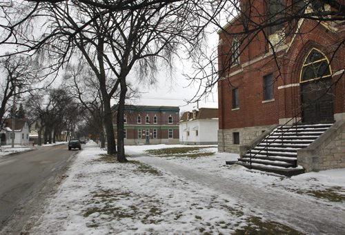 The area where emergency crews found a woman stabbed early Sunday morning.  At right is the The Bethlehem Aboriginal Fellowship at the corner of  Burrows Ave. and Charles St. Adam Wazny story. Wayne Glowacki / Winnipeg Free Press Dec.15 2014