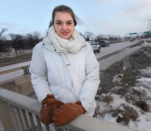 Stéphanie Demers poses along Dunkirk near Kingston Rd, the 18 year old nursing student, who saw an elderly person wandering on the road Saturday night and looked after the coatless man -- who tuned out to be dementia-afflicted  until police could get there. See Gord Sinclair story. December 15, 2015 - (Phil Hossack / Winnipeg Free Press)