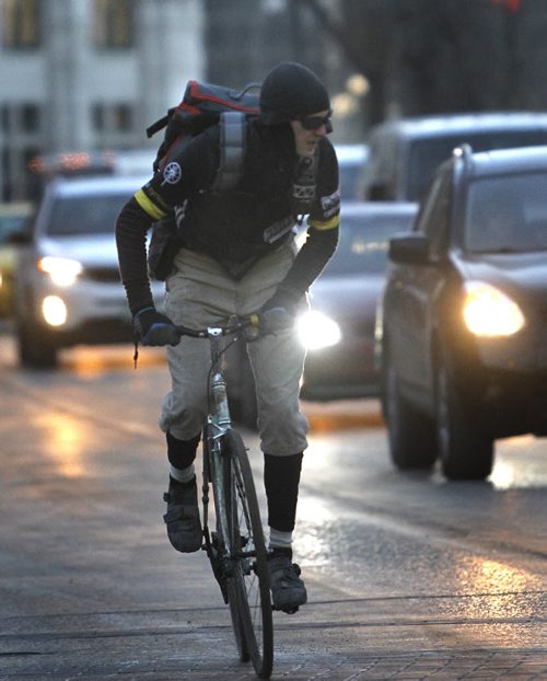 49.8 In Conversation. Bike courier Matt Magura. Stephen Burns story Wayne Glowacki / Winnipeg Free Press Dec.16 2014