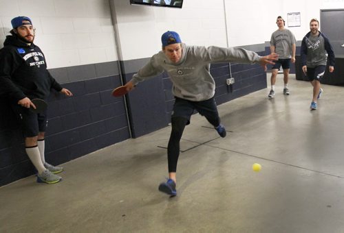 Keeping it Light- Winnipeg Jets L to r Mathieu Perreault, Paul Postma , Jim Slater, and Grant Clitsome keep it light Tuesday morning before practice with a game of ping pong in the halls of the MTS Centre- The Jets are in preparation for a home game tonight against the Buffalo Sabers- Standup photo  Dec 16, 2014   (JOE BRYKSA / WINNIPEG FREE PRESS)