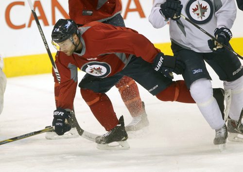 Winnipeg Jets Grant Clitsome on the ice at morning practice , his teammate Jacob Trouba was not- The Jets are in preparation for a home game tonight against the Buffalo Sabers- See Ed Tait story  Dec 16, 2014   (JOE BRYKSA / WINNIPEG FREE PRESS)