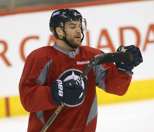 Winnipeg Jets Grant Clitsome on the ice at morning practice , his teammate Jacob Trouba was not- The Jets are in preparation for a home game tonight against the Buffalo Sabers- See Ed Tait story  Dec 16, 2014   (JOE BRYKSA / WINNIPEG FREE PRESS)