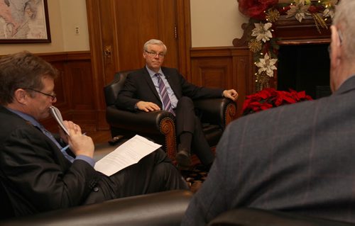 Premier Greg Selinger in his office in the Manitoba Legislature in Winnipeg Tuesday afternoon being interviewed by Free Press reporters Bruce Owen, left, and Larry Kusch- See Bruce Owen/ Larry Kusch year end interview  Dec 16, 2014   (JOE BRYKSA / WINNIPEG FREE PRESS)
