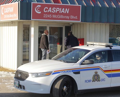 LOCAL - Caspian at 2245 McGillivray Blvd with RCMP in front. BORIS MINKEVICH / WINNIPEG FREE PRESS  December 17, 2014