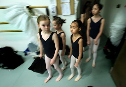 Young Dancers make their way into a rehearsal studio Thursday evening to begin another run through of "The Nutcracker". See Story. December 18,2014 - (Phil Hossack / Winnipeg Free Press)