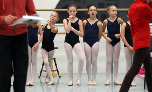 Young Dancers wait for their que in a rehearsal studio Thursday evening to begin another run through of RWB's "Nutcracker". See Story. December 18,2014 - (Phil Hossack / Winnipeg Free Press)