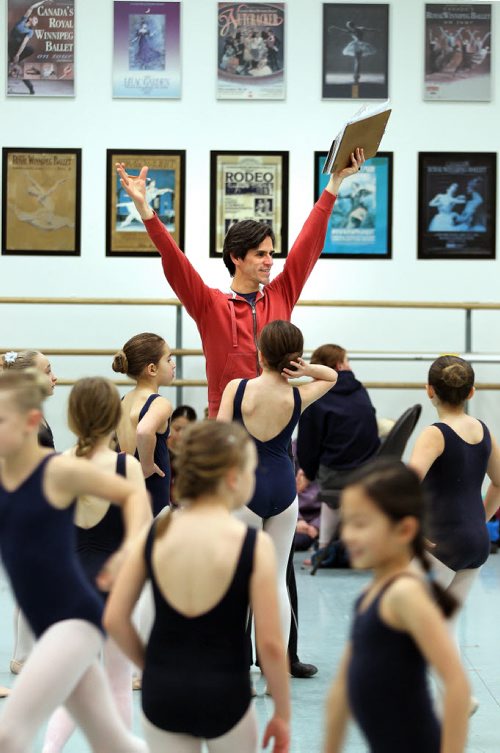 Jaime Vargas "ques" his young charges Young Dancers in a rehearsal studio Thursday evening to begin another run through of RWB's "Nutcracker". See Story. December 18,2014 - (Phil Hossack / Winnipeg Free Press)