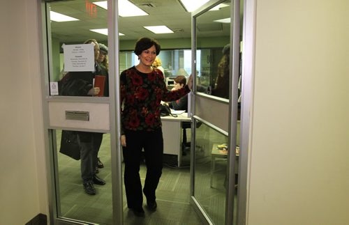 Theresa Oswald is all smiles  after she opens the door to leave the NDP office after officially signing the paperwork to enter the Manitoba NDP's leadership race Friday morning.   Dec 19/14 Ruth Bonneville / Winnipeg Free Press
