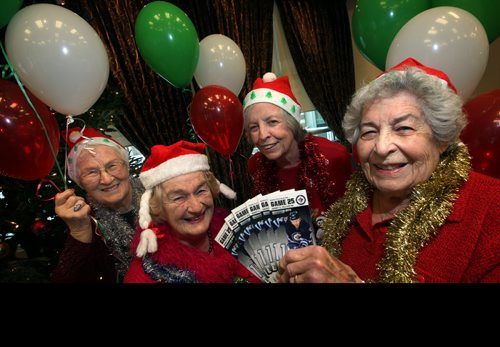 This group of ladies who usually don't sing gathered together and won the first The Hark! The Workplace Choirs Sing contest. Left to right they are: Elsie Aguire,Norma Mulcair, Elizabeth Watkins, and Pat Kettner. Part of their prize was box seats at an upcoming Jets game. December 19, 2014 - (Phil Hossack / Winnipeg Free Press)     December 19, 2014 - (Phil Hossack / Winnipeg Free Press)