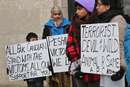 Members of the Pakistan muslim community gathered at the Manitoba Legislative Building to condemn the attack on the school in Pakistan.  141221 December 21, 2014 Mike Deal / Winnipeg Free Press