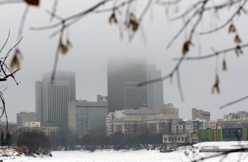 The downtown skyline under fog in Winnipeg Monday morning- Standup photo  Dec 22, 2014   (JOE BRYKSA / WINNIPEG FREE PRESS)