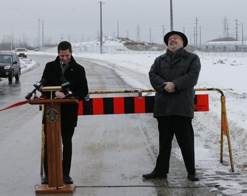 LOCAL . Left Mayor Brian Bowman makes joke calling the roadway the Russ Wyatt  Boulevard , and Councillor Russ Wyatt  Officially Open New Transcona Boulevard at 10:00 AM Monday .City of Winnipeg Funded Road to Improve East-West Connections in Transcona Winnipeg, MB Äì December 19, 2014 Äì Transcona drivers will have an easier time traveling east and west within the community when the new Transcona Boulevard officially opens on Monday. The new street, which was fully funded by the City of Winnipeg, extends from Kildare Avenue (at Plessis Road) through the old City of Winnipeg Public Works yard and connects with Ravelston Avenue W.The construction of Transcona Blvd. is part of the Transcona West Road Enhancement Project. Nearly 400 acres in Transcona have been earmarked for residential development. The multi-phase developments will include single-family and multi-family housing . Dec. 22 2014 / KEN GIGLIOTTI / WINNIPEG FREE PRESS