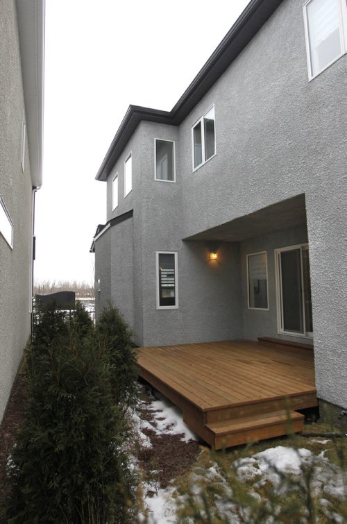 Homes  736 Sage Creek Boulevard, Derek MacDonald with Qualico Homes was the contact. This is the courtyard between the houses. Todd Lewys story Wayne Glowacki / Winnipeg Free Press Dec.23 2014