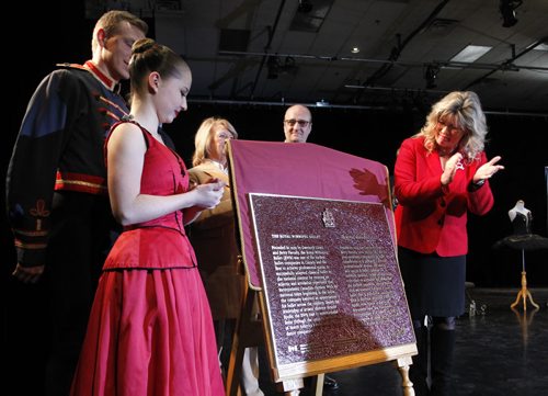 At right, Shelly Glover,MP, announced the designation of the Royal Winnipeg Ballet as a national historic event. With help from RWB students Meghan Carnegie and Luke Boguski  an Historical Sites and Monuments Board of Canada plaque was unveiled Tuesday.  Wayne Glowacki / Winnipeg Free Press Dec.23 2014