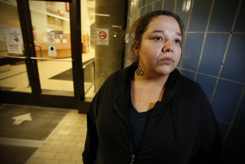 December 23, 2014 - 141223  -  Stephanie Bradley, whose mother Marlene Pelletier was killed and her children injured in a car collision, returned home to find that someone had broken in and stolen christmas gifts and money. Bradley is photographed as she talks to media outside HSC Tuesday, December 23, 2014.  John Woods / Winnipeg Free Press