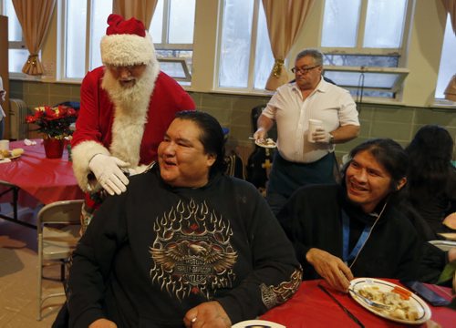 Stdup Local . AGAPE Table is serving 400 turkey dinners with all the trimmings and pumpkin pie Wed. morning , Santa is also visiting and everyone will reciev a Christmas present . Dec. 24 2014 / KEN GIGLIOTTI / WINNIPEG FREE PRESS