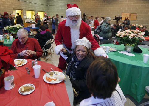 Stdup Local . AGAPE Table is serving 400 turkey dinners with all the trimmings and pumpkin pie Wed. morning , Santa is also visiting and everyone will reciev a Christmas present . Dec. 24 2014 / KEN GIGLIOTTI / WINNIPEG FREE PRESS