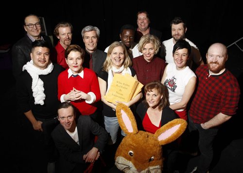 Ent. For a story on the Theatre Projects Manitoba production called White Rabbit, Red Rabbit.  Artistic director Ardith Boxall in the centre holding the scripts with some of the actors taking part in the production. From left to right in front is Tom Keenan and Janice Skene, second row is Loc Lu, Sarah Constible, Sharon Bajer, Shawna Dempsey and Carson Nattress. Back row is Ian Ross, Arne McPherson, Gord Tanner,  Bathelemy Bolivar, Leith Clark and  Stephen Sim. The story is that every night a lone actor will show up on stage and be given the script they have never seen before and then perform it on the spot. Each night a different actor will perform.  Kevin Prokosh story. Wayne Glowacki / Winnipeg Free Press Dec.23 2014