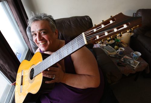 Chet Breau, son of guitar legend Lenny Breau-Chet  holds one one of his late fathers guitars  a seven-string model - See Gordon Sinclair story  Dec 24, 2014   (JOE BRYKSA / WINNIPEG FREE PRESS)