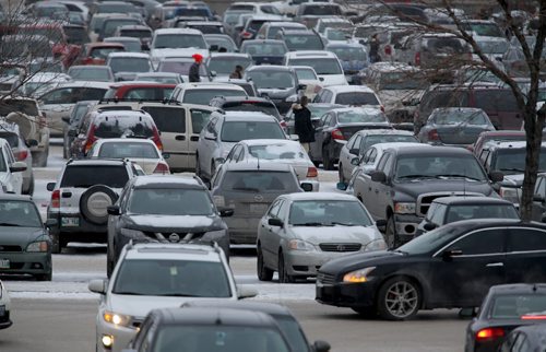 The parking lot at Polo Park mall is completely packed for Boxing Day shopping, Friday, December 26, 2014. (TREVOR HAGAN/WINNIPEG FREE PRESS)