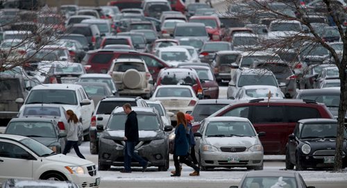 The parking lot at Polo Park mall is completely packed for Boxing Day shopping, Friday, December 26, 2014. (TREVOR HAGAN/WINNIPEG FREE PRESS)
