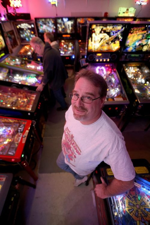 Rick owns close to 50 pinball machines and hosts a group every Friday to play pinball, Friday, December 26, 2014. (TREVOR HAGAN/WINNIPEG FREE PRESS) - for dave sanderson