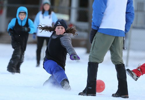 Jasmine Decaire, 10, fights for the ball during soccer action at the 16th annual ÄòSnow BowlÄô at La Verendrye School in Crescentwood on Dec. 27, 2014. Photo by Jason Halstead/Winnipeg Free Press