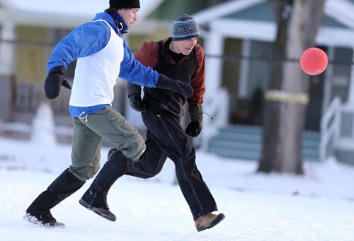 Mark Hudson (right) and Colin Kinsella battle for the ball during soccer action at the 16th annual ÄòSnow BowlÄô at La Verendrye School in Crescentwood on Dec. 27, 2014. Photo by Jason Halstead/Winnipeg Free Press