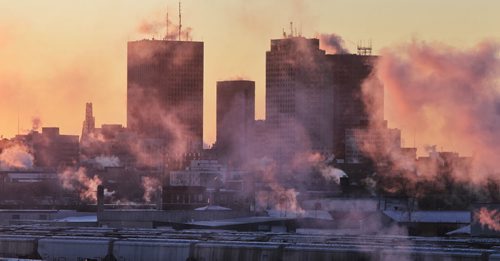 Vapour rises from the rooftops of downtown Winnipeg as temperatures sit at around -25C early Sunday morning.   141228 December 28, 2014 Mike Deal / Winnipeg Free Press