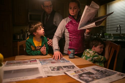 7:03:43 AM All four of the Bowman family members at the breakfast table. The eldest son, Hayden, 6, joined the family for morning smoothies (berries, protein powder, flax, banana, avocado, honey and vanilla).  141215 - Monday, December 15, 2014 - (Melissa Tait / Winnipeg Free Press)