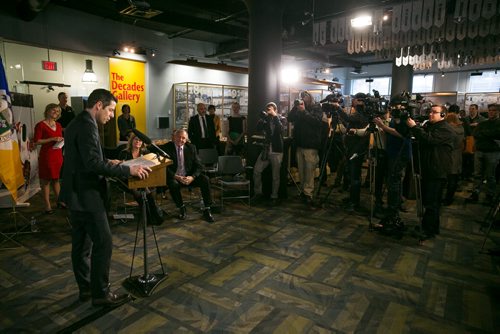 11:53:35 AM  Eyes of the media on Bowman as he makes remarks at the podium on the Year of Sport 2015 and the 2017 Canada Summer Games hosted in Winnipeg. 141215 - Monday, December 15, 2014 - (Melissa Tait / Winnipeg Free Press)