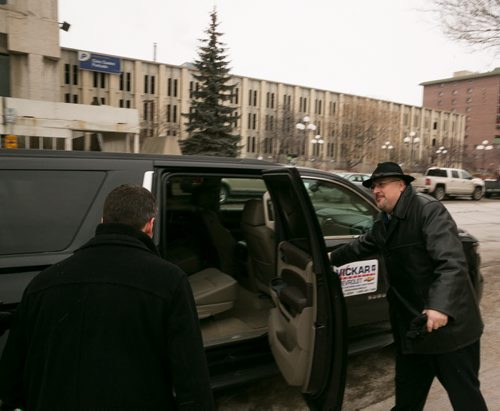 1:34:37 PM  After finishing up some paper work Bowman is picked up at City Hall by Trancona councillor Russ Wyatt for a guided tour (in a borrowed SUV) of some selected sites in Transcona. 141215 - Monday, December 15, 2014 - (Melissa Tait / Winnipeg Free Press)