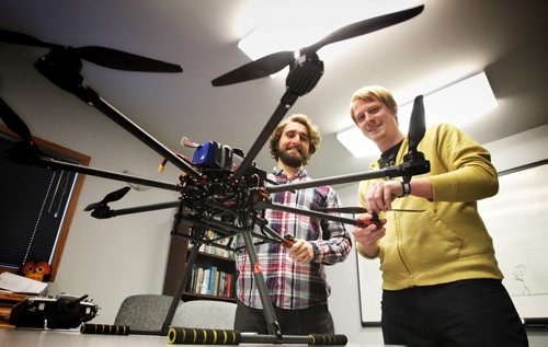 Winnipeg company BASI, Buoyant Aircraft Systems International, is working on developing a drone flight school for Transport Canada, and wants to see drone pilots licensed similarly to drivers. (L-r) Bryan Drobot and Curtis Einarson.  141230 December 30, 2014 Mike Deal / Winnipeg Free Press