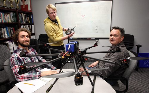 Winnipeg company BASI, Buoyant Aircraft Systems International, is working on developing a drone flight school for Transport Canada, and wants to see drone pilots licensed similarly to drivers. (L-r) Bryan Drobot, Curtis Einarson and Dake George.  141230 December 30, 2014 Mike Deal / Winnipeg Free Press